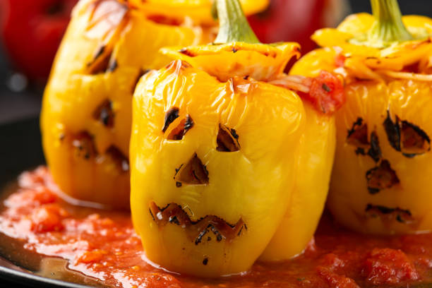 istock Jack o lanterns stuffed yellow pepper for Halloween. 1351823037