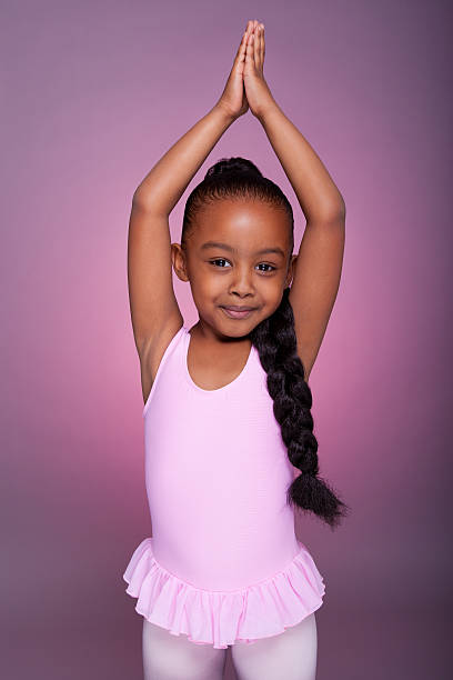 linda little african american girl dancing - ballet dress studio shot costume fotografías e imágenes de stock