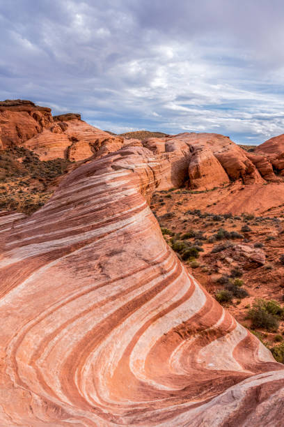 istock Iconic Fire Wave rock formation in the Valley of Fire State Park, Nevada 1351829363