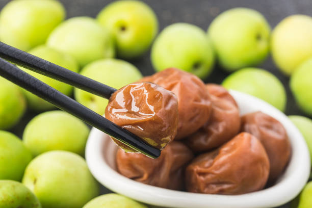 Fresh green plum and preserved green plum