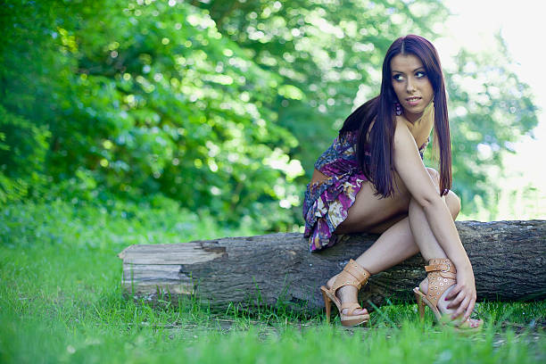 Girl on a tree trunk