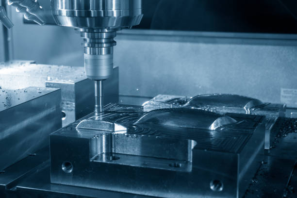 istock The CNC milling machine rough cutting the injection mold parts by indexable  endmill tools. 1351833683
