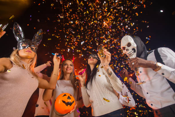 istock People dancing on Halloween party 1351835148