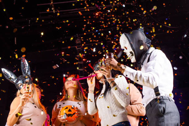 istock People dancing on Halloween party 1351835161