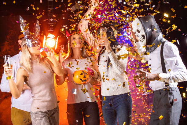 istock People dancing on Halloween party 1351835176