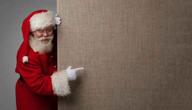 istock Santa Claus pointing fabric billboard 1351835501
