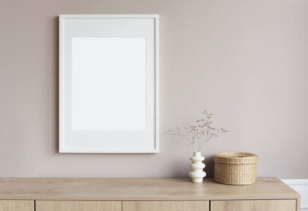 istock Artwork mock-up in interior design. Blank white picture frame on a wall 1351836277