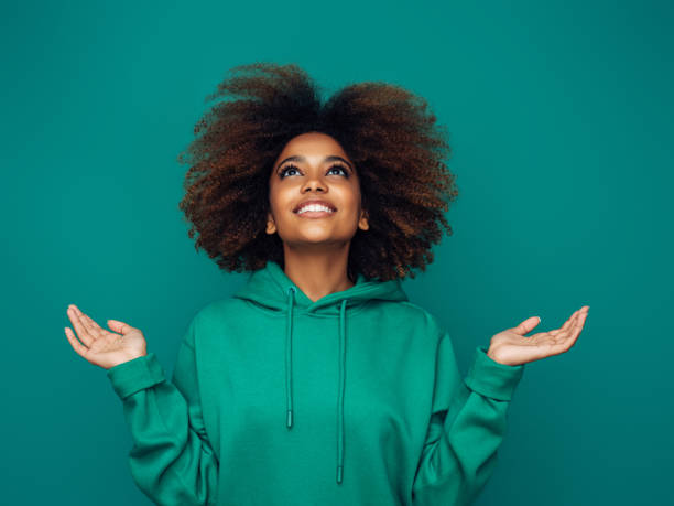 istock Beautiful afro woman 1351837395