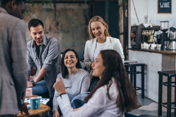 istock People in office talking during informal meeting. 1351837475