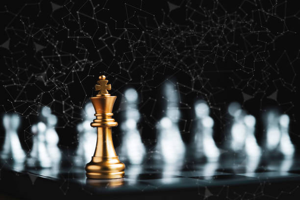 istock Golden king chess encounter with silver chess enemy on dark background and connection line for strategy idea and futuristic concept 1351838863