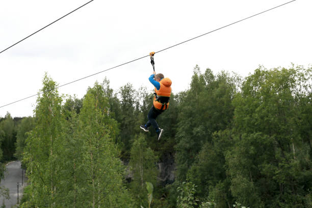 istock Child riding zipline in Ruskeala Park 1351841098
