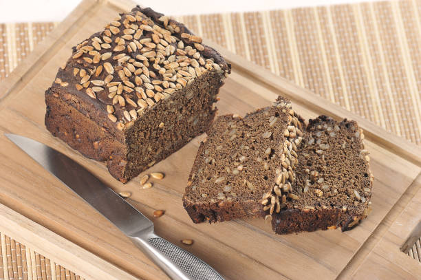 istock bread with sunflower seeds on a wooden board 1351841290