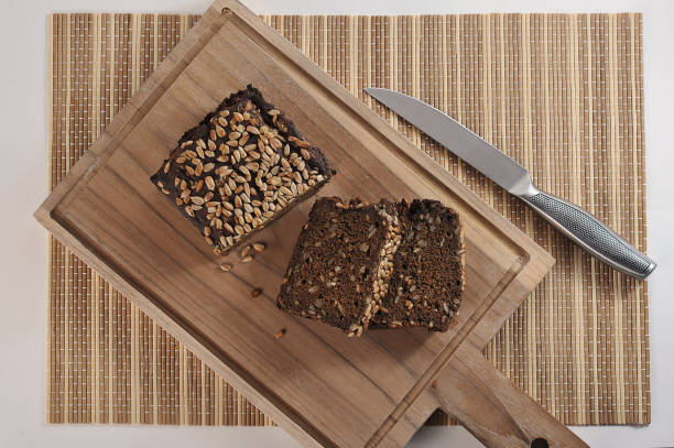 istock bread with sunflower seeds on a wooden board 1351841320