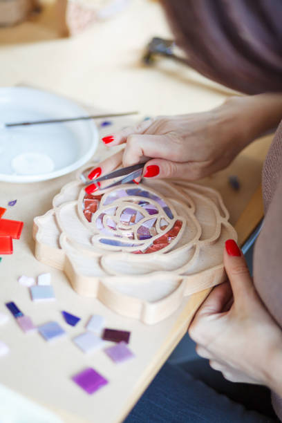 istock The process of creating a flower from a mosaic. 1351843989