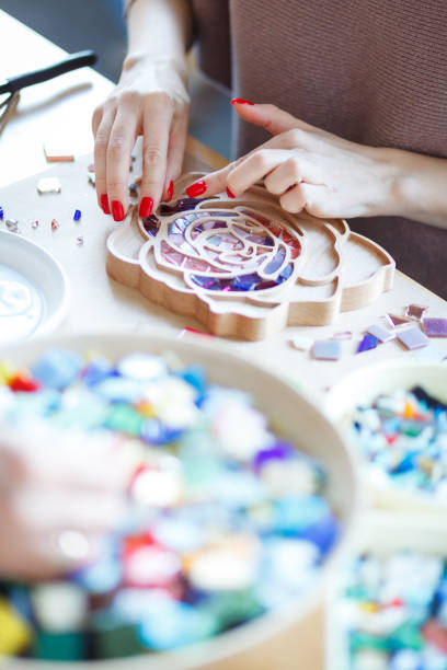 istock The process of creating a flower from a mosaic. 1351843996