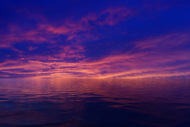 istock Seascape under a bright purple evening sky 1351844032