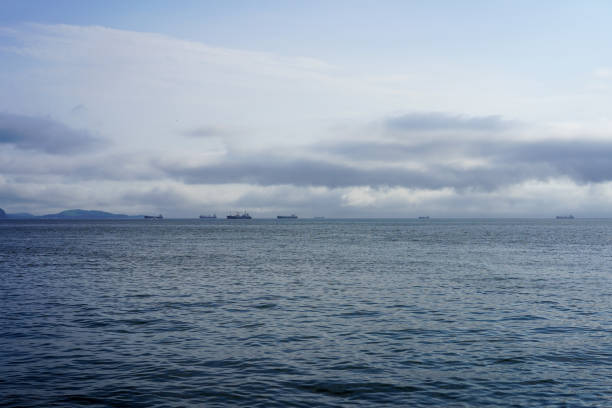istock Seascape with ships on the horizon 1351844111