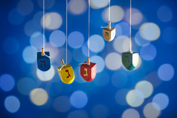 Dreidels on the bokeh lights background