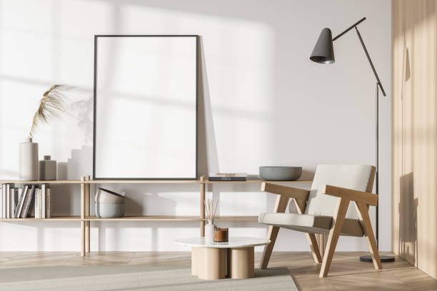 istock Empty standing canvas in white living room area 1351849149