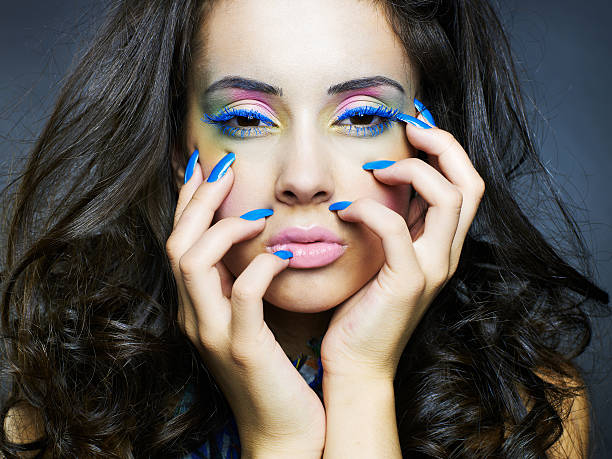 istock Beautiful woman with bright makeup and manicure 135184926