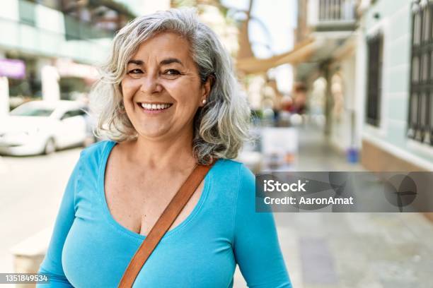 Middle Age Greyhaired Woman Smiling Happy Standing At The City Stock Photo - Download Image Now