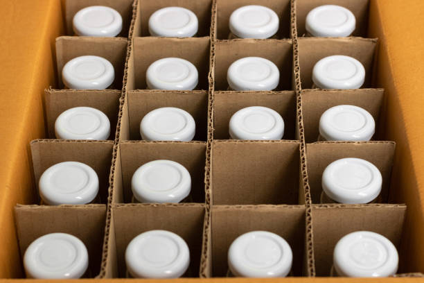 istock glass bottles in a cardboard box with partitions for transporting broken items. 1351851175