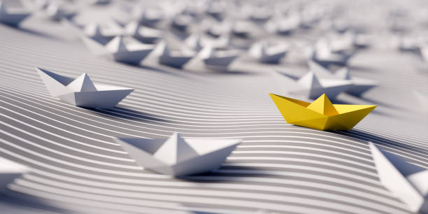 istock Conceptual paper ship; personal challenge and team competition concepts, 3d rendering 1351851261