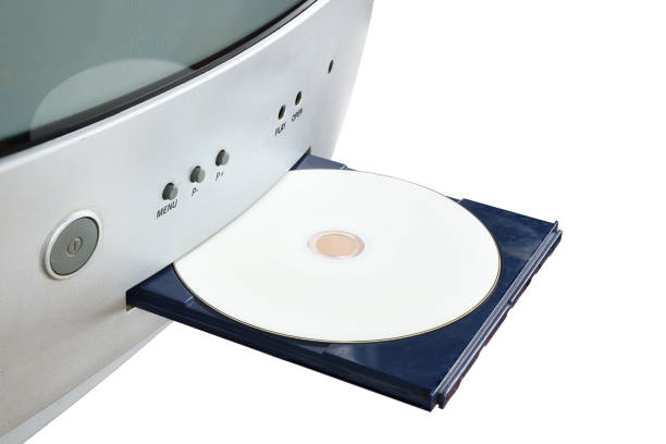 Old CRT TV with DVD player and disc isolated on white background.