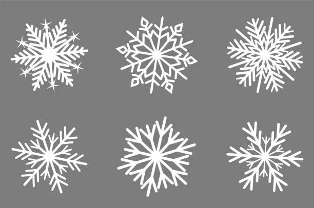 Vector illustration of Set of nordic snowflakes on gray background.