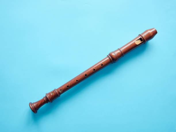istock Baroque recorder isolated on blue background 1351853589