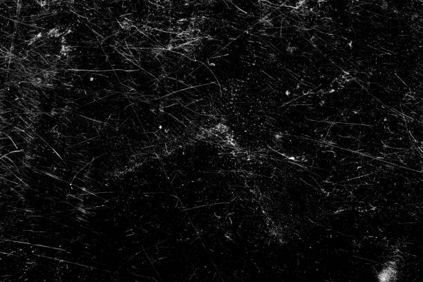 istock scratches isolated on a black background. template for design 1351856796