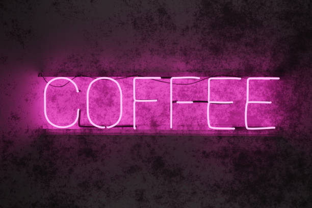 istock 3D illustration  neon tube coffee sign on a concrete wall, fluorescent light illustration 1351858546