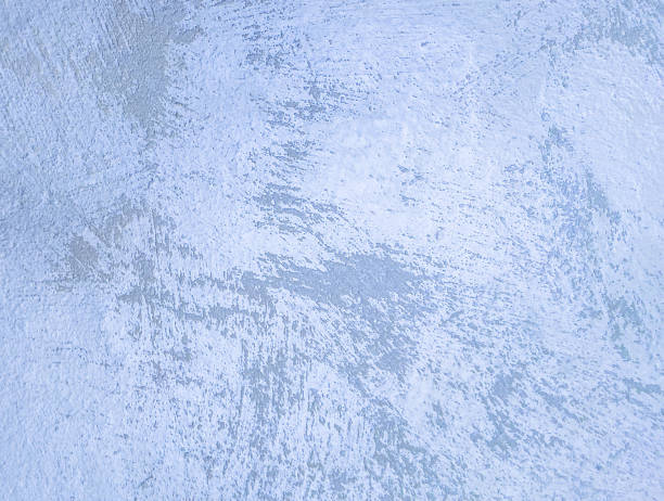 istock concrete plastered wall, decorative plaster, background gray with blue color 1351859686