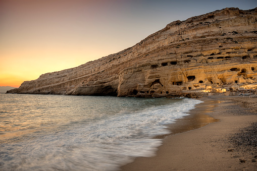 Matala is a village located 75 km south-west of Heraklion, Crete, Greece. It has been suggested that the caves were once used as tombs or living spaces.