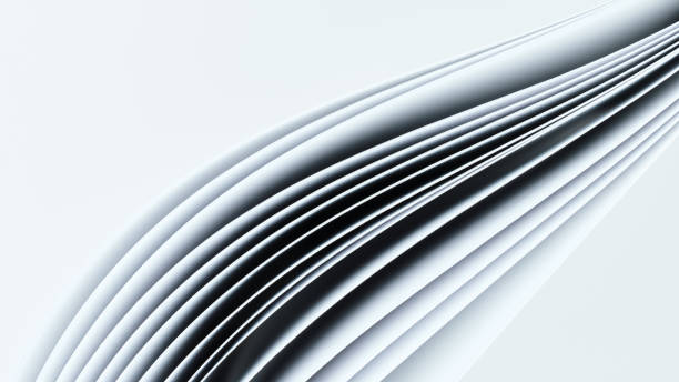 istock Several curved sheets of paper on a white background 1351866083