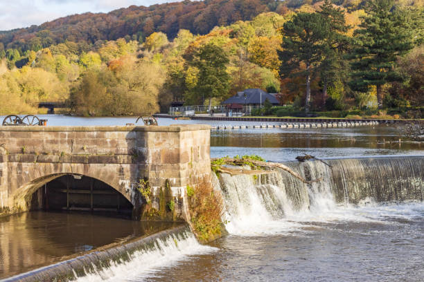 istock Horseshoe Weir on River Derwent at Belper in Derbyshire, England 1351867246