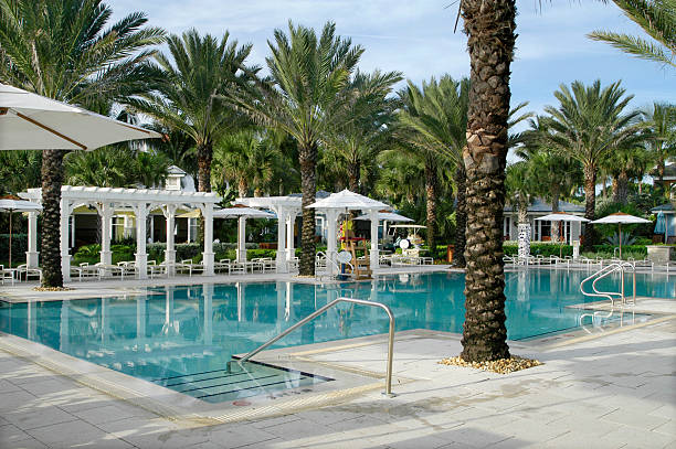 istock Pergolas, bungalows, and pool at a beach club. 135186793