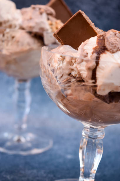 istock Ice cream with chocolate bar in crystal glasees 1351868257