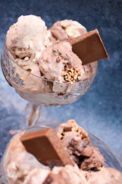 istock Ice cream with chocolate bar in crystal glasees 1351868333