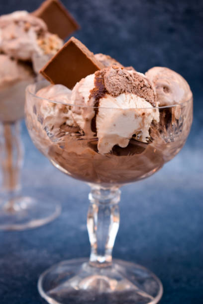 istock Ice cream with chocolate bar in crystal glasees 1351868335