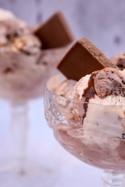 istock Ice cream with chocolate bar in crystal glasees 1351868390