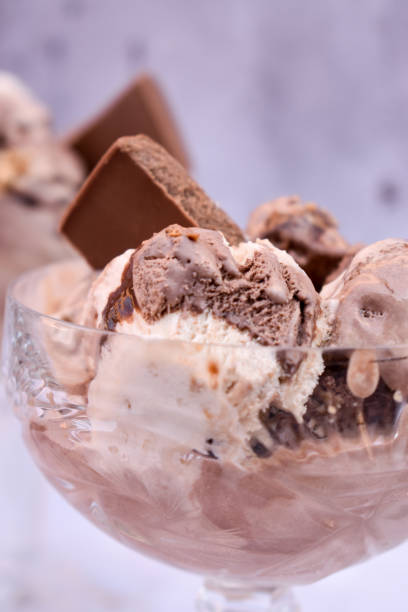 istock Ice cream with chocolate bar in crystal glasees 1351868467