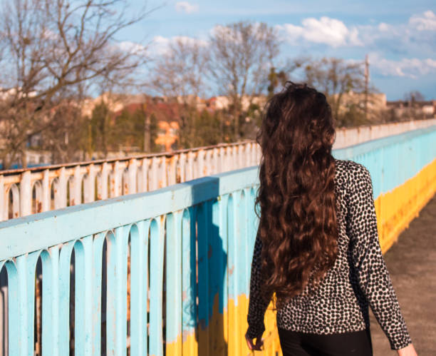istock girl on the bridge 1351868631