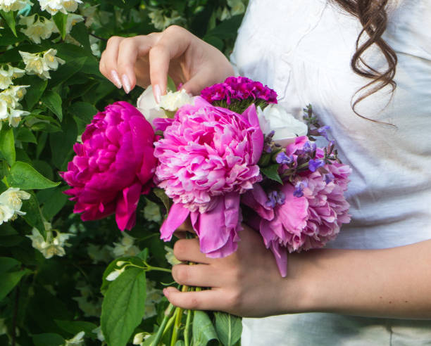 istock girl with flowers 1351868756