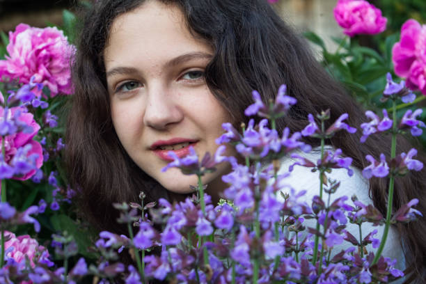 istock girl with flowers 1351868995
