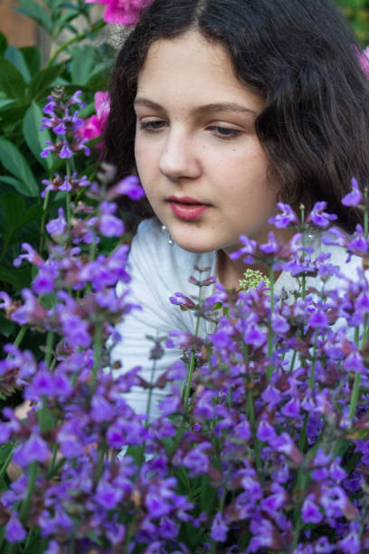 istock girl with flowers 1351869005