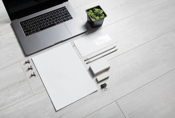 istock Blank stationery and laptop 1351872872