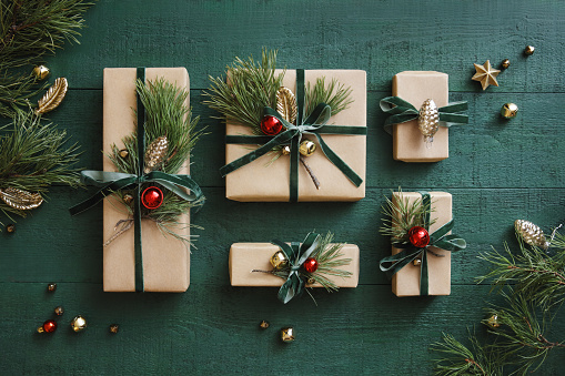 High angle view of Christmas presents wrapped in kraft paper