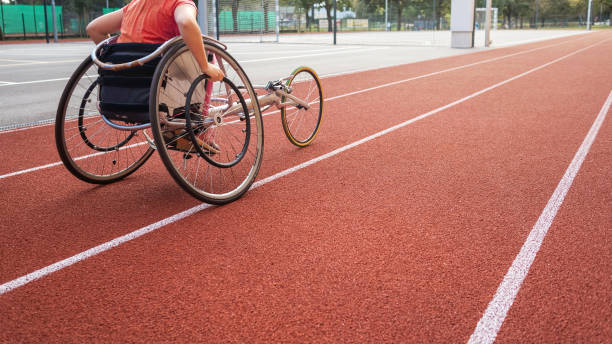 istock Athletic wheelchair race 1351873368