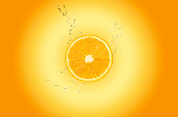 istock Water drops fresh Orange fruits isolated on Orange background. 1351874237